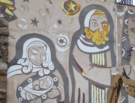 Mural de Linyola, per celebrar els 20 anys de pessebres vivents, de l'artista Ana Pulido.